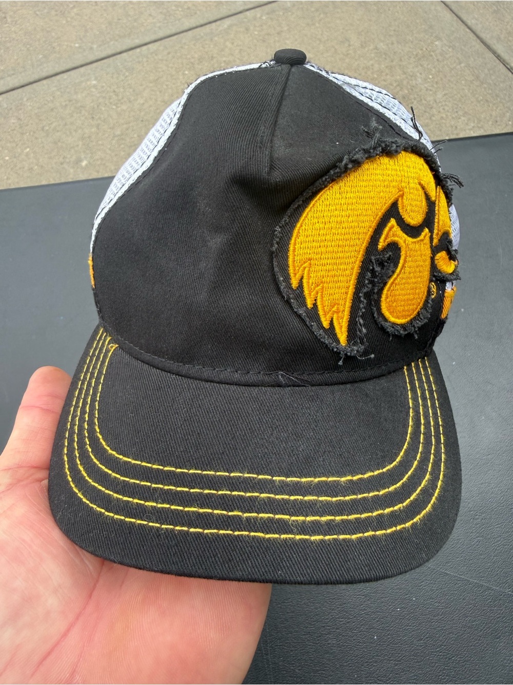 New Era Iowa Hawkeyes black cap with yellow embroidered logo